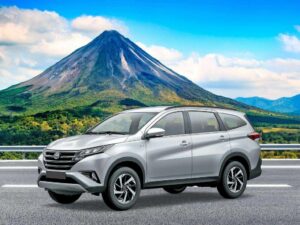 Toyota Rush rental car parked in a scenic outdoor setting La Fortuna Arenal