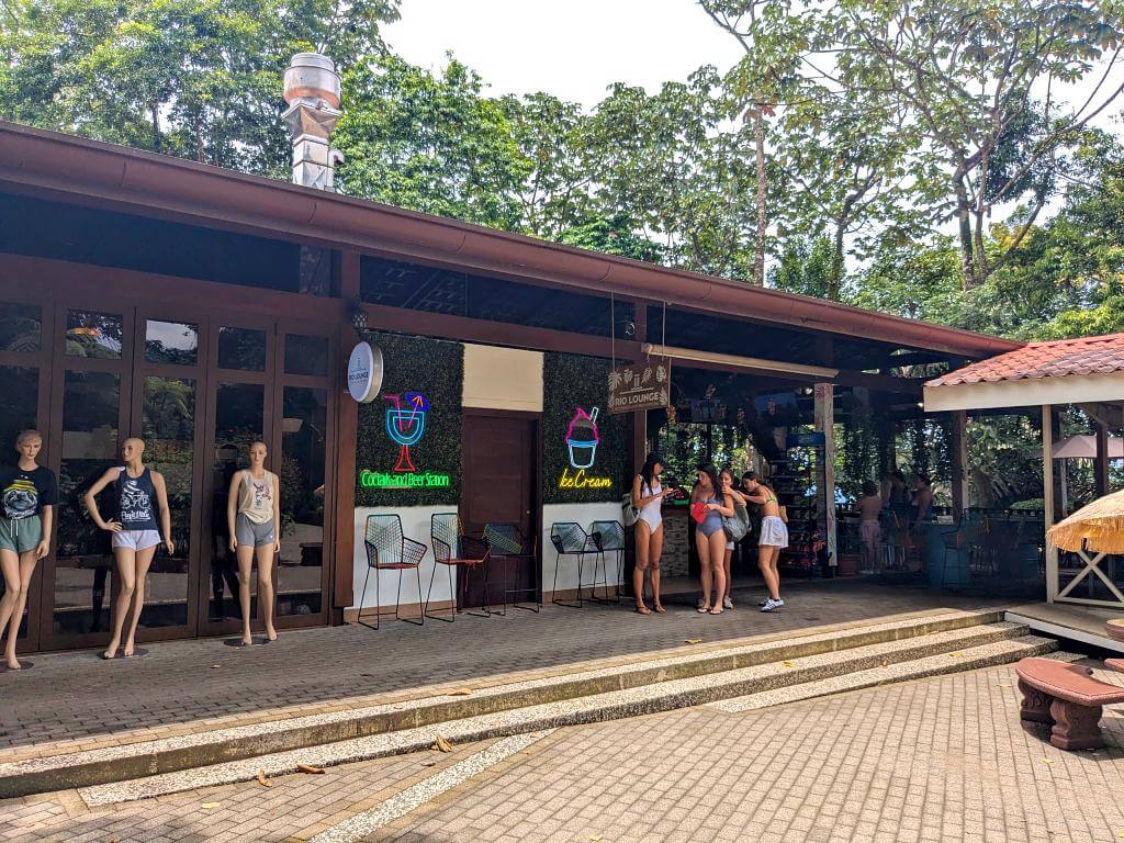 View of Rio Lounge Restaurant near the exit of the La Fortuna Waterfall trail, offering food and drinks.