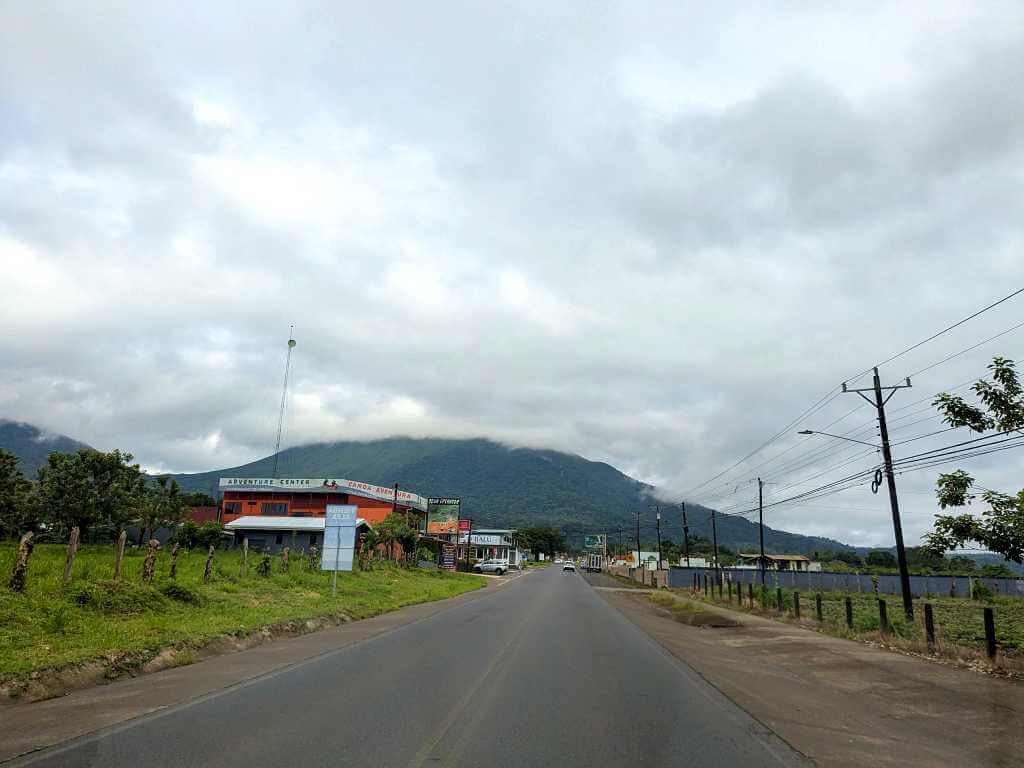 One-lane paved road from La Fortuna downtown to Arenal Lake, surrounded by scenic views of the La Fortuna area.